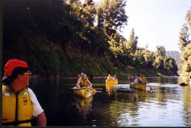 The crew of the Whanganui trip in their canoes: left to right - Robert, Britta, (Susanne behind), Leo, Katie, David, Claudia